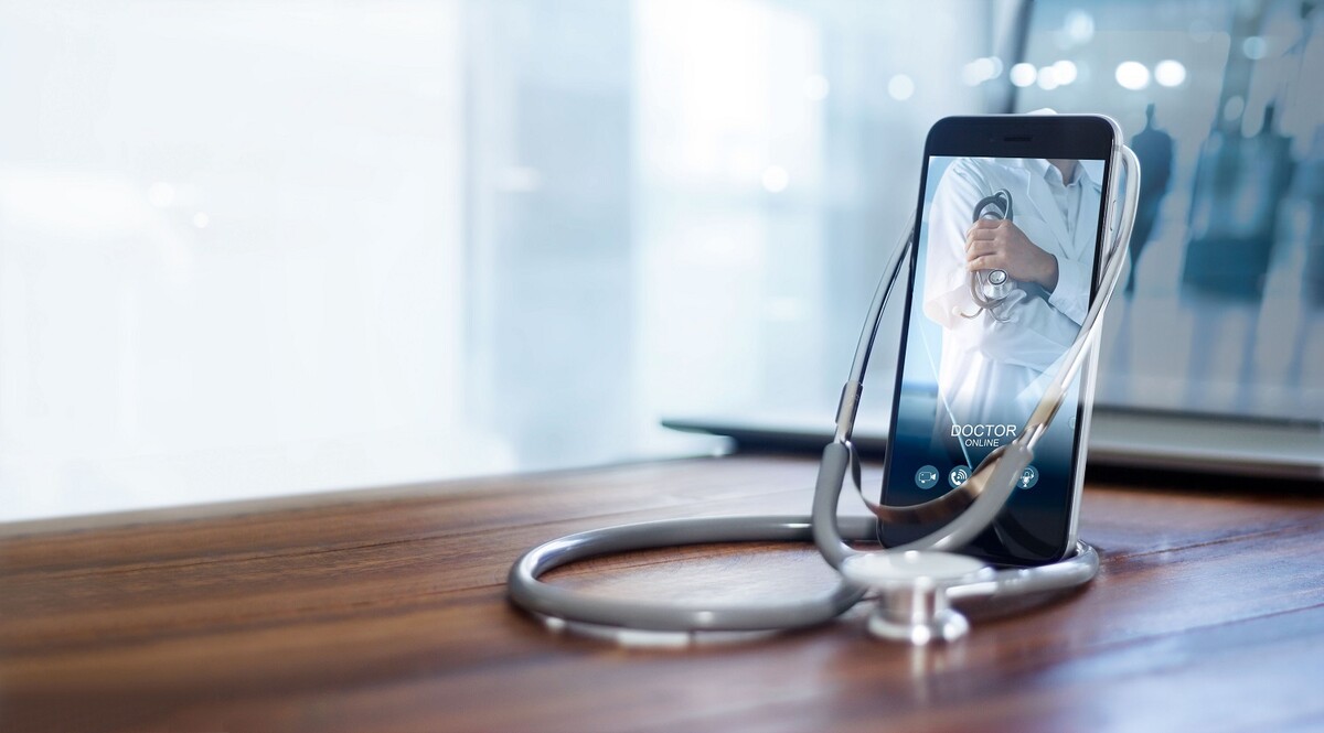 Doctor online, online medical communication network  with patient, Online medical consultation, Doctor through the phone screen using stethoscope checks and analysis health care. 